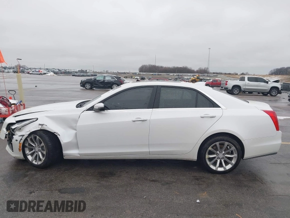 2017 Cadillac CTS Luxury AWD with VIN 1G6AX5SS6H0144758, listed as a IAAI auction lot 41745057 with 83,052 mi miles and . Bid and sale history available at DreamBid. Image 14.