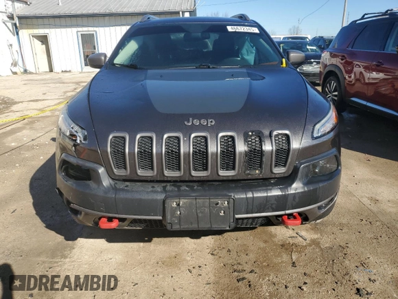 2014 Jeep Cherokee Trailhawk with VIN 1C4PJMBS1EW161642, listed as a Copart auction lot 46672345 with 196,908 mi miles and Salvage Title. Bid and sale history available at carsss.com. Image 5.