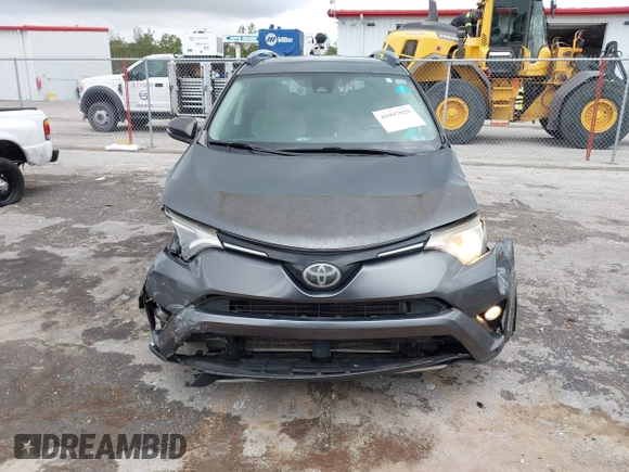 2017 Toyota RAV4 XLE with VIN JTMWFREVXHD096998, listed as a IAAI auction lot 41997925 with 119,564 mi miles and . Bid and sale history available at DreamBid. Image 6.