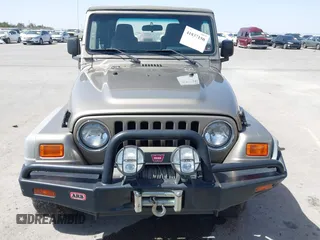 2003 Jeep Wrangler X with VIN 1J4FA39S03P312550, listed as a IAAI auction lot 41837150 with 127,239 mi miles and . Bid and sale history available at DreamBid. Image 12.