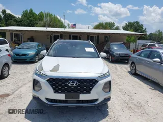 2019 Hyundai Santa Fe Limited z VIN 5NMS5CAA1KH136238, wystawiony jako IAAI lot #42314285 z przebiegiem 74 606 mil mil oraz . Historia ofert i sprzedaży dostępna na DreamBid. Obrazek 12.