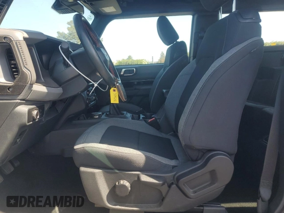 2023 Ford Bronco with VIN 1FMDE5CH2PLA96705, listed as a Copart auction lot 60813415 with 14,760 mi miles and Salvage title. Bid and sale history available at DreamBid. Image 7.