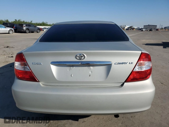 2004 Toyota Camry LE with VIN 4T1BE32K24U265992, listed as a Copart auction lot 53761975 with 97,006 mi miles and Salvage Title. Bid and sale history available at DreamBid. Image 6.