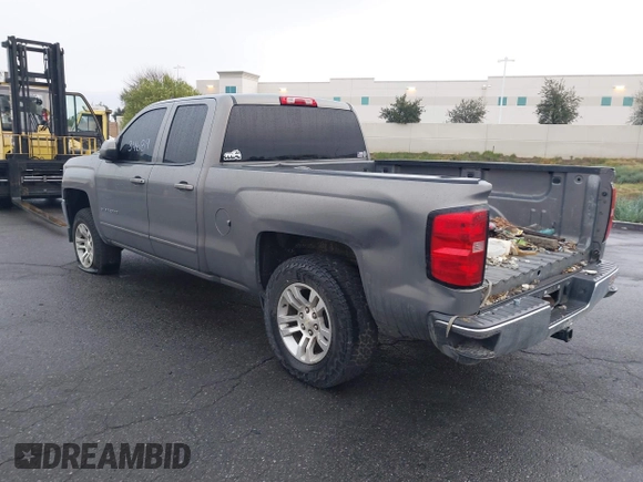 2017 Chevrolet Silverado 1500 LT with VIN 1GCRCRECXHZ159962, listed as a IAAI auction lot 41634689 with 145,978 mi miles and . Bid and sale history available at DreamBid. Image 3.