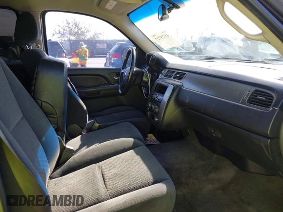 2007 Chevrolet Tahoe LTZ with VIN 1GNFC13J37R134588, listed as a IAAI auction lot 41725727 with 127,540 mi miles and . Bid and sale history available at DreamBid. Image 5.