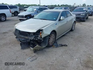 2013 Cadillac CTS Luxury with VIN 1G6DE5E55D0120843, listed as a IAAI auction lot 42145982 with 147,127 mi miles and . Bid and sale history available at DreamBid. Image 17.