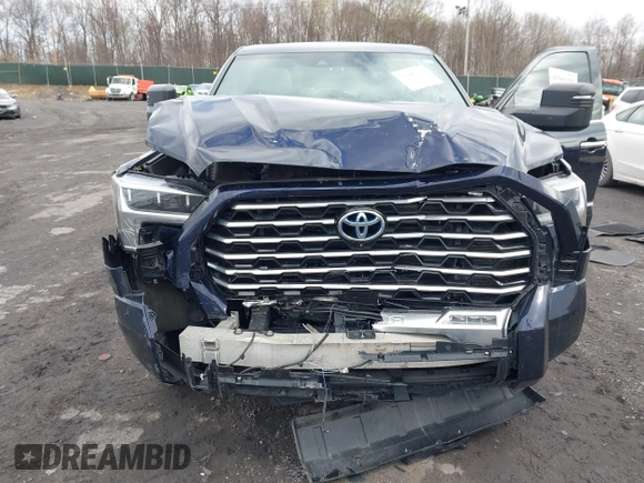 2022 Toyota Tundra Capstone Hybrid with VIN 5TFVC5DB5NX009829, listed as a IAAI auction lot 41983391 with 70,015 mi miles and . Bid and sale history available at DreamBid. Image 6.