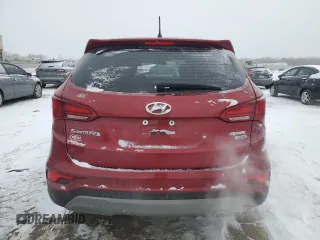 2018 Hyundai Santa Fe 2.4L z VIN 5XYZTDLB0JG547428, wystawiony jako Copart lot #45593005 z przebiegiem 51 394 mil mil oraz Szkoda całkowita • Salvage title. Historia ofert i sprzedaży dostępna na DreamBid. Obrazek 6.