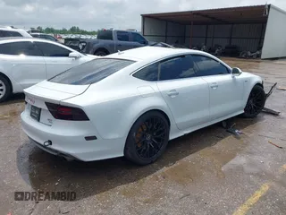 2014 Audi A7 Prestige z VIN WAU2GAFC7EN126780, wystawiony jako IAAI lot #42095865 z przebiegiem Nie podano mil oraz . Historia ofert i sprzedaży dostępna na DreamBid. Obrazek 4.