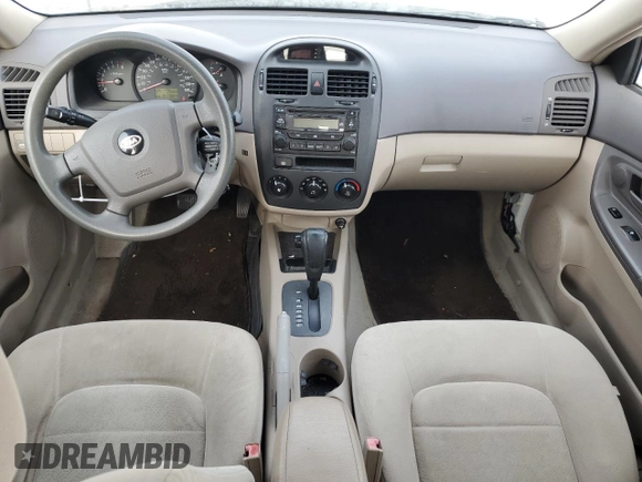 2006 Kia Spectra EX with VIN KNAFE121265208526, listed as a Copart auction lot 80300604 with 101,780 mi miles and Salvage Title. Bid and sale history available at carsss.com. Image 8.