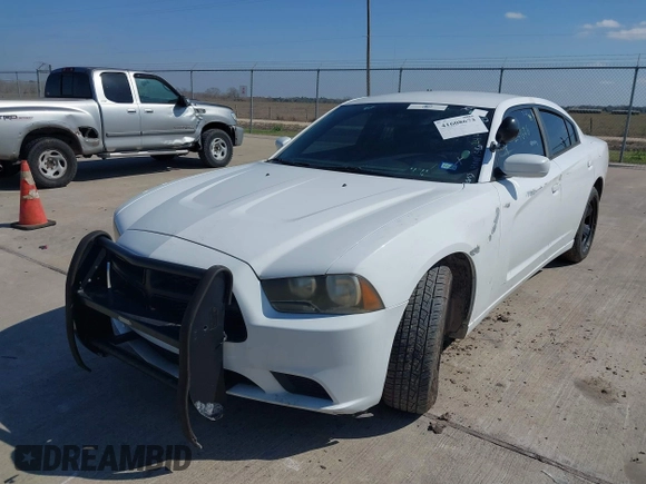 2012 Dodge Charger Police with VIN 2C3CDXAT6CH305817, listed as a IAAI auction lot 41608673 with 173,761 mi miles. Bid and sale history available at carsss.com. Image 6.