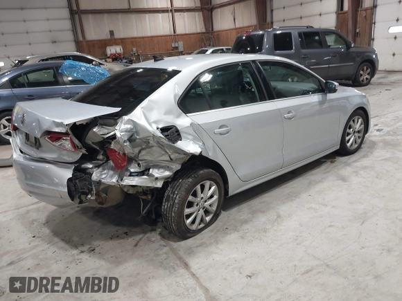 2014 Volkswagen Jetta Sedan SE w/Connectivity/Sunroof PZEV with VIN 3VWD17AJ9EM437804, listed as a IAAI auction lot 42026842 with 83,114 mi miles. Bid and sale history available at carsss.com. Image 4.
