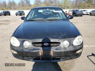 2001 Kia Spectra GS z VIN KNAFB161115036033, wystawiony jako Copart lot #55939335 z przebiegiem 76 414 mil mil oraz Szkoda całkowita • Salvage title. Historia ofert i sprzedaży dostępna na DreamBid. Obrazek 5.