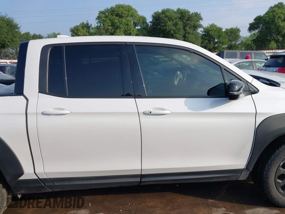 2023 Honda Ridgeline Black Edition with VIN 5FPYK3F84PB011792, listed as a IAAI auction lot 42049593 with 21,002 mi miles and . Bid and sale history available at DreamBid. Image 14.