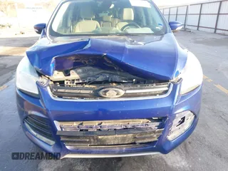 2014 Ford Escape Titanium with VIN 1FMCU9JX4EUD30964, listed as a IAAI auction lot 41772153 with 179,481 mi miles and . Bid and sale history available at DreamBid. Image 6.