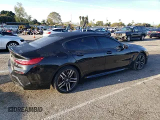 2020 BMW 8 Series 840i with VIN WBAGV4C06LCE28998, listed as a Copart auction lot 48566634 with 54,946 mi miles and Salvage title. Bid and sale history available at DreamBid. Image 3.