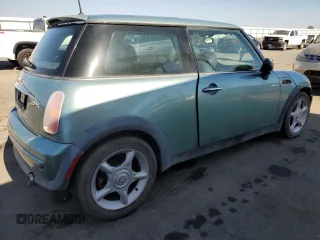 2002 MINI Hardtop with VIN WMWRC33422TE13196, listed as a Copart auction lot 59277643 with 80,501 mi miles and Non Repairable. Bid and sale history available at DreamBid. Image 3.
