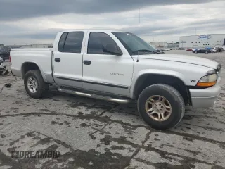 2002 Dodge Dakota SLT z VIN 1B7HG48N22S614075, wystawiony jako Copart lot #57783905 z przebiegiem 247 769 mil mil oraz Szkoda całkowita • Salvage title. Historia ofert i sprzedaży dostępna na DreamBid. Obrazek 4.