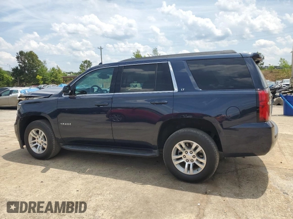 2020 Chevrolet Tahoe LT with VIN 1GNSKBKC7LR162186, listed as a Copart auction lot 56729325 with 114,210 mi miles and Salvage title. Bid and sale history available at DreamBid. Image 2.