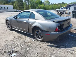 2003 Ford Mustang Standard z VIN 1FAFP40463F327753, wystawiony jako IAAI lot #42005257 z przebiegiem 325 449 mil mil oraz . Historia ofert i sprzedaży dostępna na DreamBid. Obrazek 3.