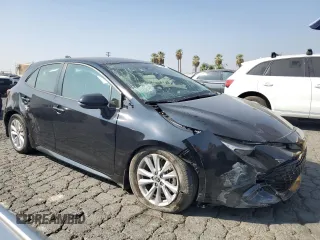 2023 Toyota Corolla Hatchback SE with VIN JTND4MBE3P3205743, listed as a Copart auction lot 76208354 with 22,632 mi miles and Salvage Title. Bid and sale history available at carsss.com. Image 4.