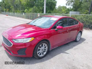 2020 Ford Fusion SE with VIN 3FA6P0HD5LR164755, listed as a IAAI auction lot 42092028 with 96,959 mi miles and . Bid and sale history available at DreamBid. Image 2.