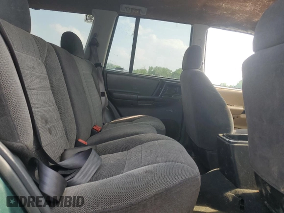 1997 Jeep Grand Cherokee Laredo with VIN 1J4GZ58SXVC595012, listed as a Copart auction lot 59746655 with Not provided miles and Salvage title. Bid and sale history available at DreamBid. Image 11.