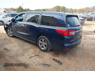 2019 Honda Odyssey EX-L with VIN 5FNRL6H72KB090503, listed as a IAAI auction lot 40958508 with 101,597 mi miles. Bid and sale history available at carsss.com. Image 3.