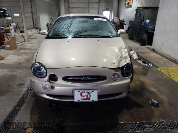 1999 Ford Taurus SE with VIN 1FAFP53S6XA242981, listed as a Copart auction lot 43211425 with 111,966 mi miles and Salvage title. Bid and sale history available at DreamBid. Image 5.