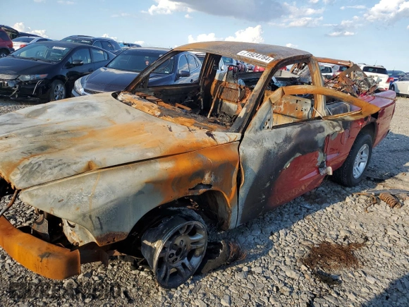 2003 Dodge Dakota with VIN 1D7GG16X23S267062, listed as a Copart auction lot 71924784 with 0 mi miles and Salvage Title. Bid and sale history available at carsss.com. Image 1.