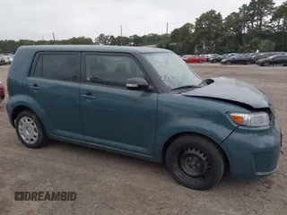 2010 Scion xB z VIN JTLZE4FE5A1114983, wystawiony jako IAAI lot #40535590 z przebiegiem 70 917 mil mil oraz . Historia ofert i sprzedaży dostępna na DreamBid. Obrazek 1.