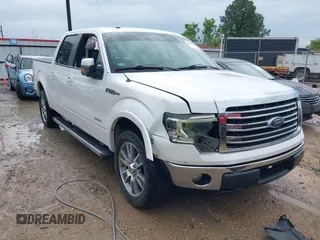 2014 Ford F-150 XL with VIN 1FTFW1CTXEKF15524, listed as a IAAI auction lot 42109740 with 154,554 mi miles and . Bid and sale history available at DreamBid. Image 1.