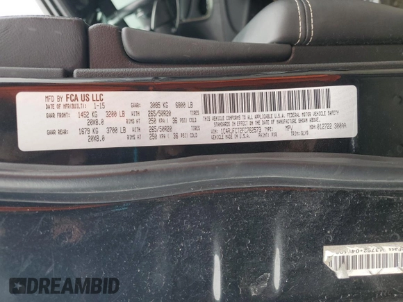 2015 Jeep Grand Cherokee Overland with VIN 1C4RJFCT2FC762573, listed as a Copart auction lot 59123275 with 229,128 mi miles and Salvage title. Bid and sale history available at DreamBid. Image 12.