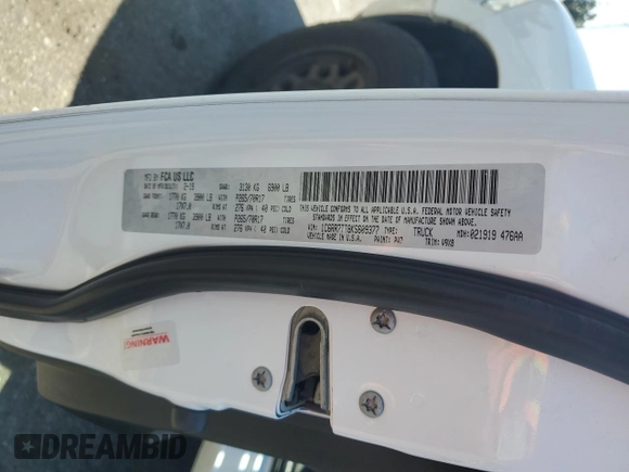 2019 Ram 1500 Big Horn with VIN 1C6RR7TT8KS609377, listed as a Copart auction lot 60875495 with 128,933 mi miles and Salvage title. Bid and sale history available at DreamBid. Image 13.