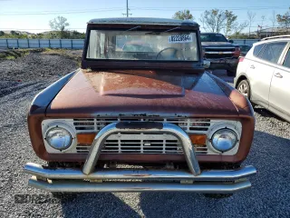 1976 Ford Bronco z VIN U15GLB55374, wystawiony jako Copart lot #82228864 z przebiegiem 289 351 mil mil oraz Nie do naprawy • Non repairable. Historia ofert i sprzedaży dostępna na DreamBid. Obrazek 5.