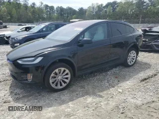 2017 Tesla Model X 90D z VIN 5YJXCBE22HF052514, wystawiony jako Copart lot #50879795 z przebiegiem 139 546 mil mil oraz Szkoda całkowita • Salvage title. Historia ofert i sprzedaży dostępna na DreamBid. Obrazek 1.