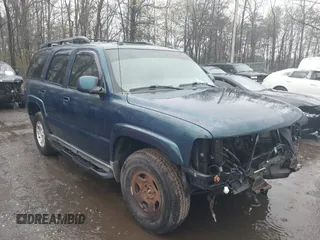 2005 Chevrolet Tahoe LT z VIN 1GNEK13T75R253693, wystawiony jako IAAI lot #42013420 z przebiegiem 152 952 mil mil oraz . Historia ofert i sprzedaży dostępna na DreamBid. Obrazek 1.