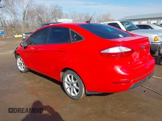 2015 Ford Fiesta SE with VIN 3FADP4BJ2FM101983, listed as a IAAI auction lot 41485881 with 131,805 mi miles. Bid and sale history available at carsss.com. Image 3.