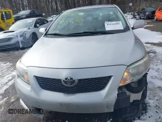 2009 Toyota Corolla with VIN 1NXBU40E19Z009548, listed as a IAAI auction lot 41310085 with 122,944 mi miles. Bid and sale history available at carsss.com. Image 12.