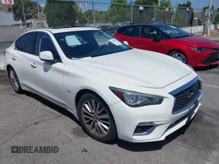 2019 Infiniti Q50 Luxe z VIN JN1EV7AP7KM518276, wystawiony jako IAAI lot #42148033 z przebiegiem 56 720 mil mil oraz . Historia ofert i sprzedaży dostępna na DreamBid. Obrazek 1.