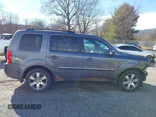 2014 Honda Pilot Touring with VIN 5FNYF4H95EB019048, listed as a IAAI auction lot 41526958 with 172,252 mi miles and . Bid and sale history available at DreamBid. Image 13.