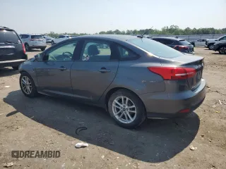 2017 Ford Focus SE with VIN 1FADP3F25HL202470, listed as a Copart auction lot 59941835 with 142,628 mi miles and Salvage title. Bid and sale history available at DreamBid. Image 2.