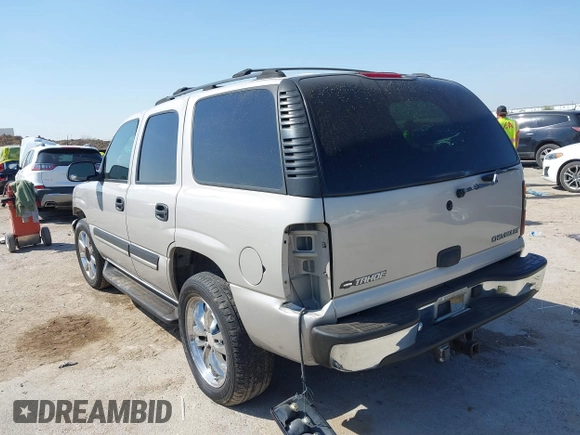 2004 Chevrolet Tahoe LT with VIN 1GNEC13Z84J315648, listed as a IAAI auction lot 41868112 with 198,901 mi miles. Bid and sale history available at carsss.com. Image 3.
