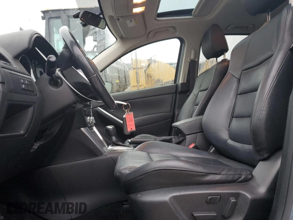 2015 Mazda CX-5 Grand Touring with VIN JM3KE2DY4F0526671, listed as a Copart auction lot 46520505 with 129,017 mi miles and Salvage Title. Bid and sale history available at carsss.com. Image 7.