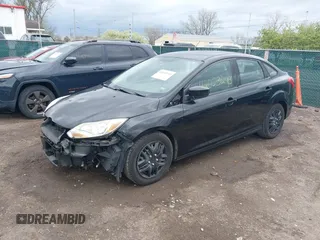 2012 Ford Focus SE with VIN 1FAHP3F27CL112277, listed as a IAAI auction lot 42053243 with 104,885 mi miles. Bid and sale history available at carsss.com. Image 18.