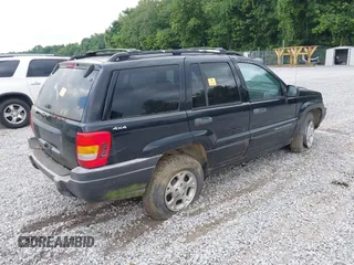 1999 Jeep Grand Cherokee Laredo with VIN 1J4GW58S0XC524798, listed as a IAAI auction lot 42761040 with 173,792 mi miles and . Bid and sale history available at DreamBid. Image 4.