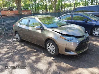 2018 Toyota Corolla L with VIN 5YFBURHE1JP793222, listed as a IAAI auction lot 42128961 with 125,139 mi miles and . Bid and sale history available at DreamBid. Image 1.
