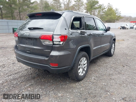 2021 Jeep Grand Cherokee Laredo X with VIN 1C4RJFAG6MC703691, listed as a IAAI auction lot 41655340 with 53,300 mi miles and . Bid and sale history available at DreamBid. Image 4.
