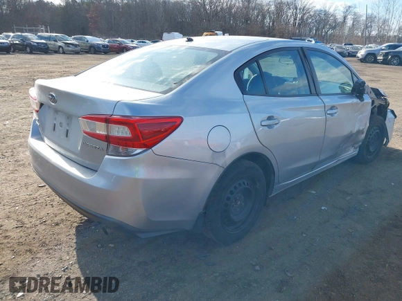 2018 Subaru Impreza with VIN 4S3GKAA67J3622063, listed as a IAAI auction lot 41318036 with 75,713 mi miles and . Bid and sale history available at DreamBid. Image 4.