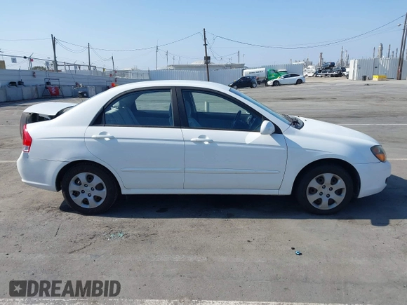 2009 Kia Spectra LX z VIN KNAFE222995623894, wystawiony jako IAAI lot #42385181 z przebiegiem 119 030 mil mil oraz . Historia ofert i sprzedaży dostępna na DreamBid. Obrazek 13.